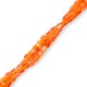 Faceted glass beads Cube 2x2mm Orange-pearl shine coating